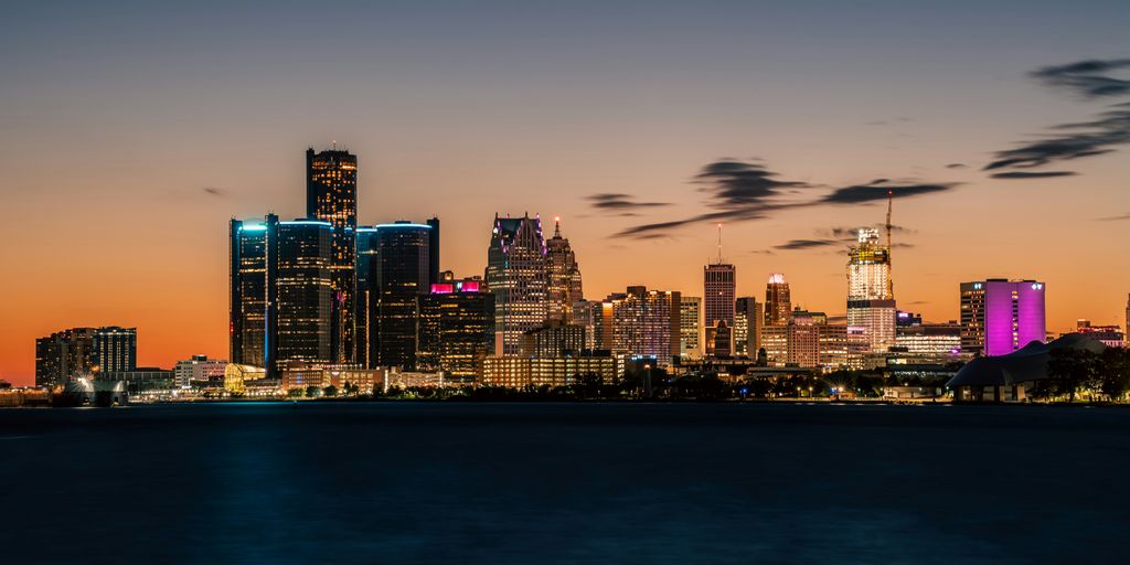 a view of a city at night from across the water