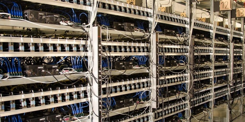 Bitcoin mining farm with futuristic technology and glowing halving symbol