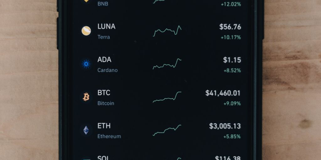A smartphone displaying cryptocurrency market prices and trends.