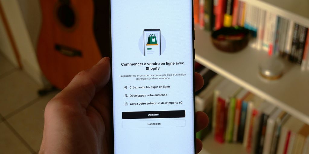 A phone shows a shopify app setup screen.