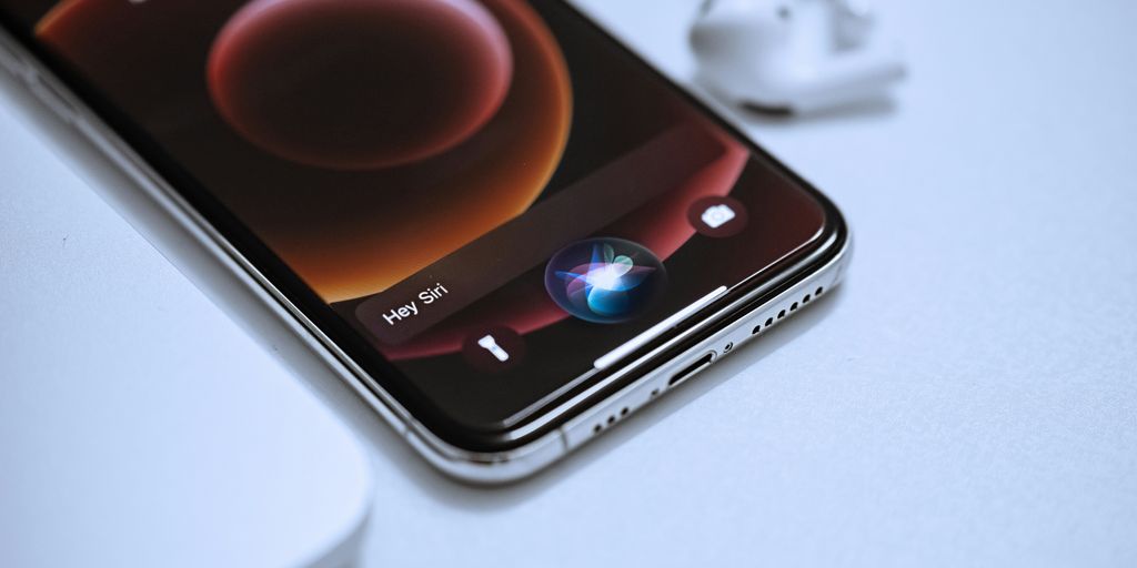 black android smartphone on white table
