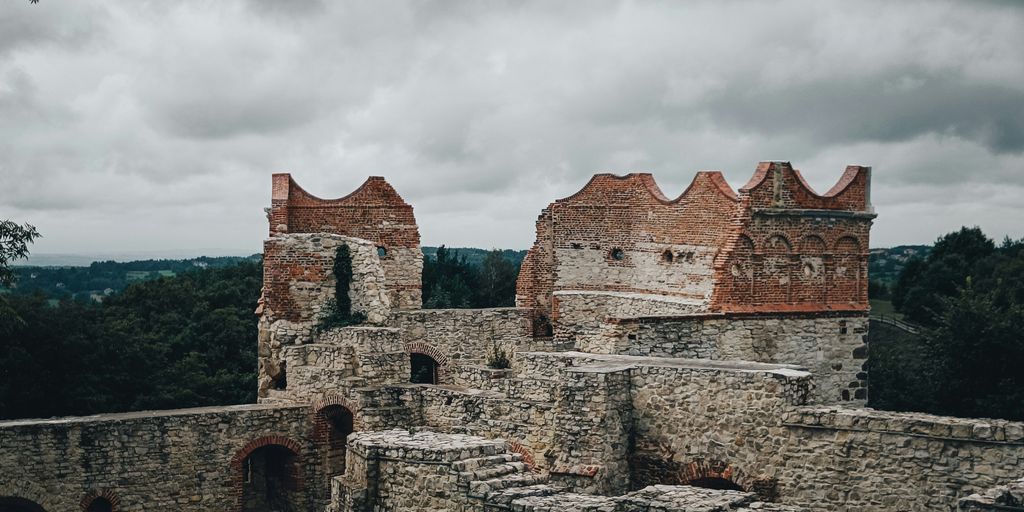 a stone building with a stone wall