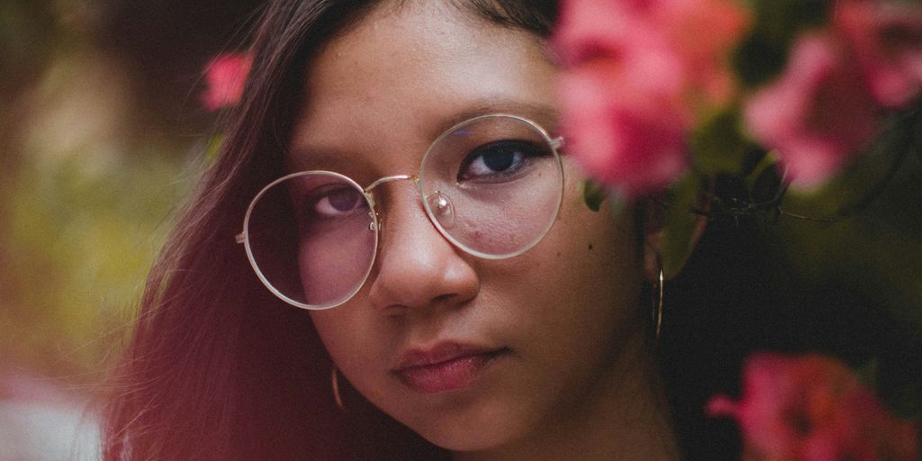 photo of woman wearing eyeglasses