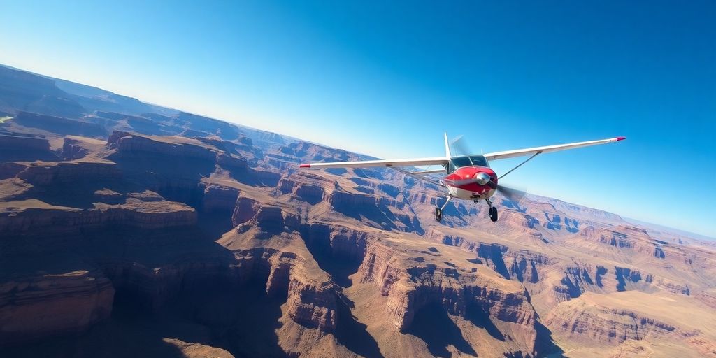 A small airplane flying over the vast Grand Canyon.