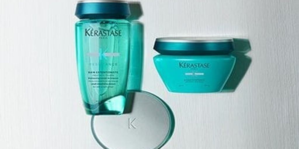 Kérastase hair care products displayed on a neutral background.