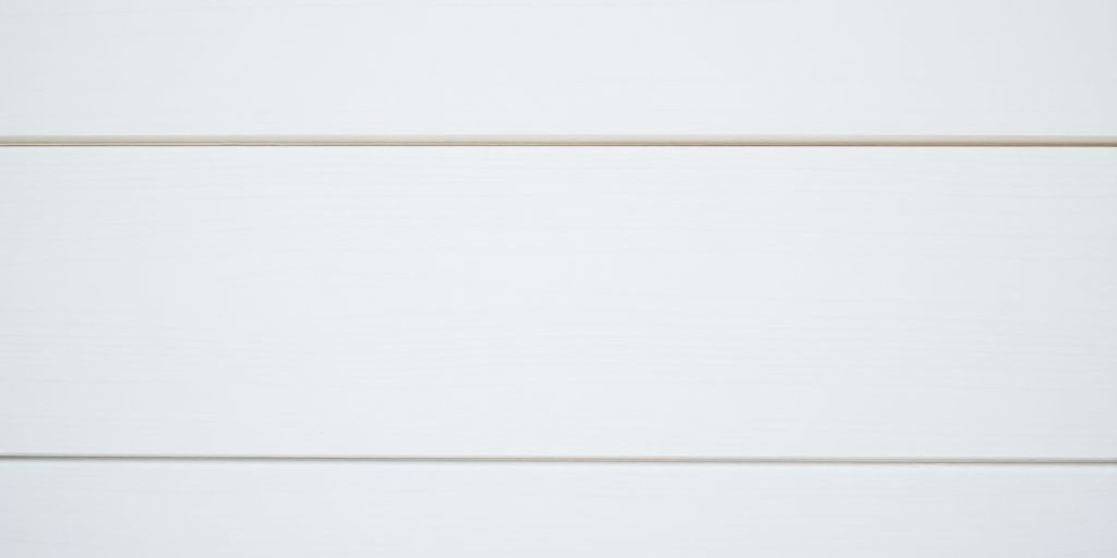 Painted wood paneling, close-up, smooth finish.