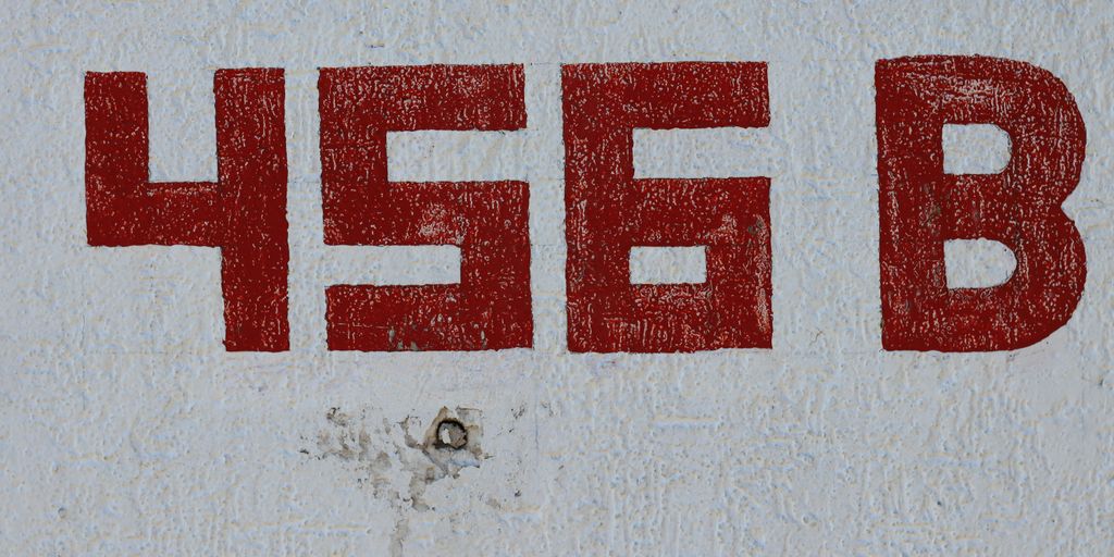 Red numbers "456 b" are printed on a white surface.