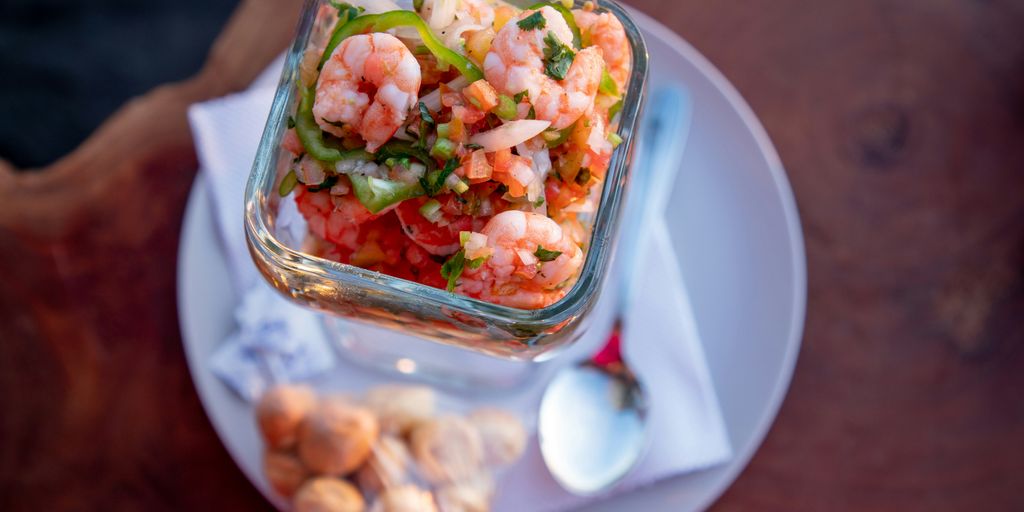 sliced vegetables in clear glass container
