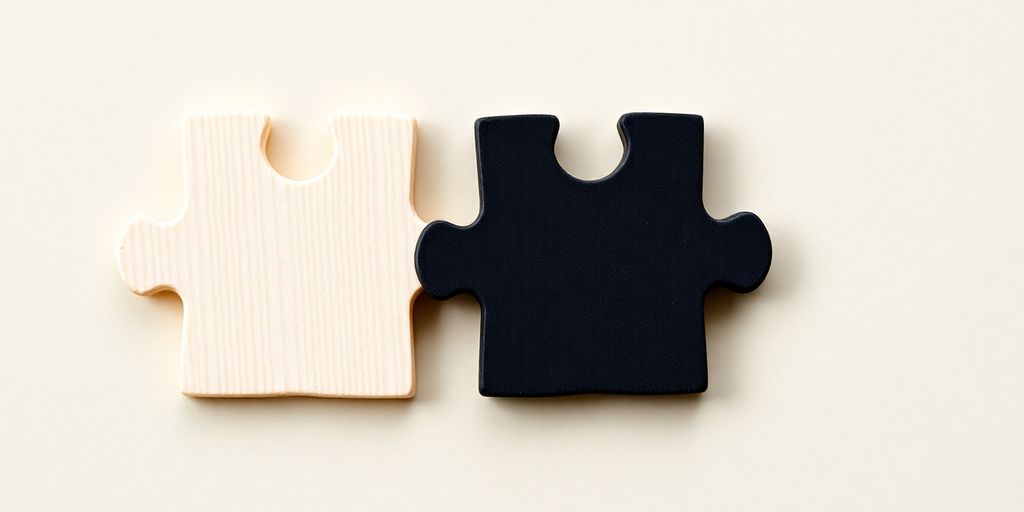 Two puzzle pieces fitting together perfectly.