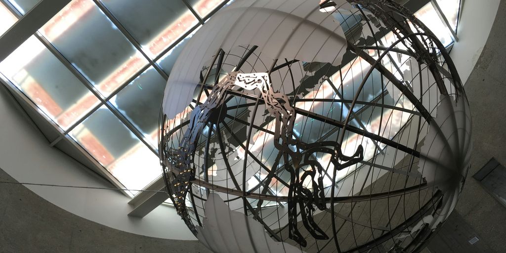 a clock hanging from the ceiling