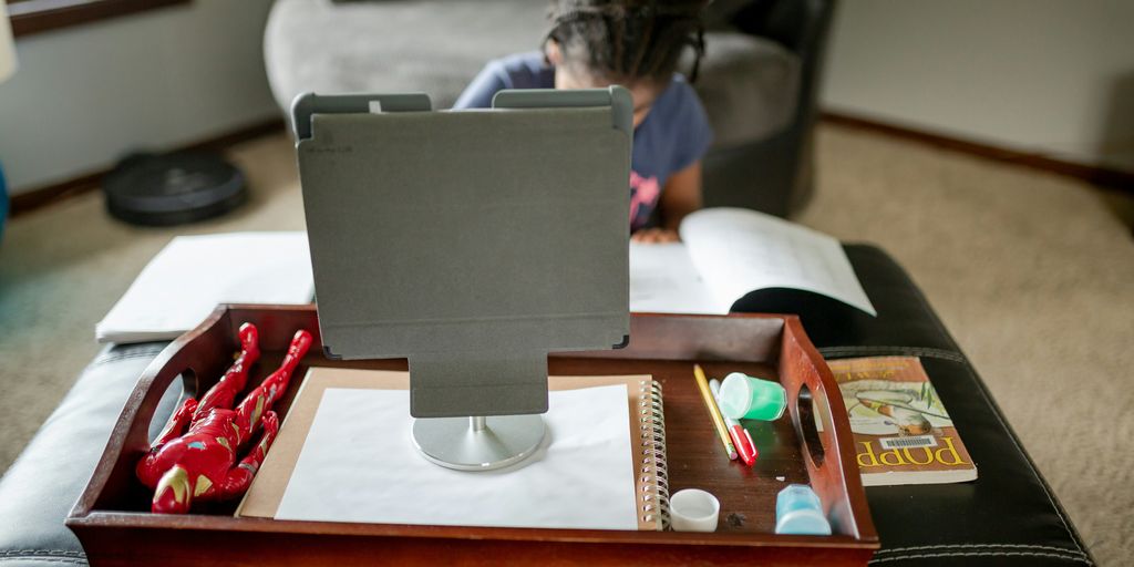 black flat screen computer monitor on brown wooden table