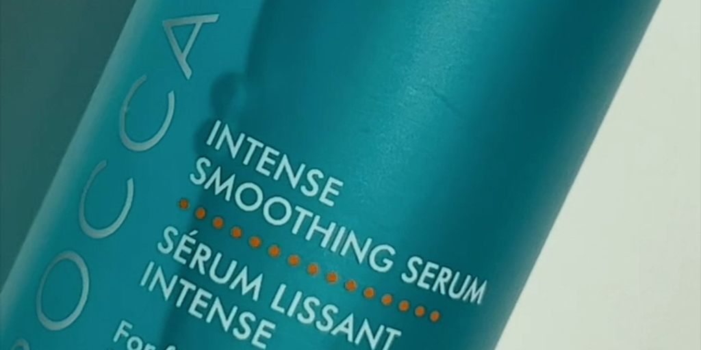 Bottle of Moroccanoil Intense Smoothing Serum for frizz control.