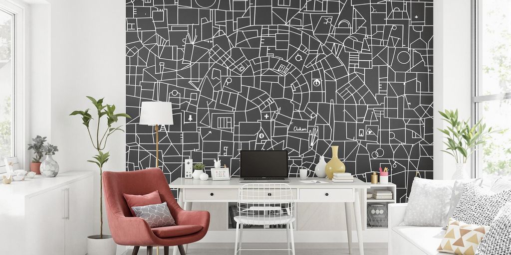 Modern room with magnetic blackboard wallpaper in use.