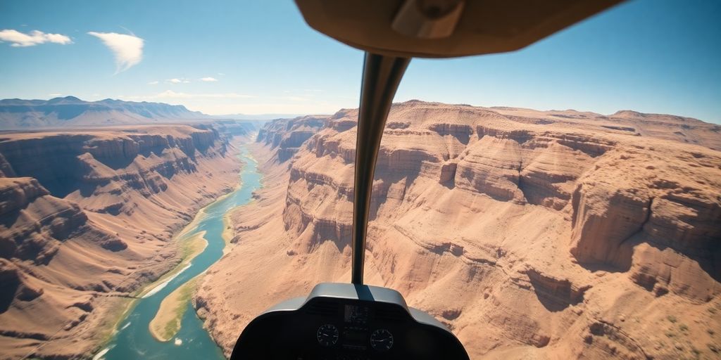 A helicopter with a pilot flying over a vast wilderness canyon.