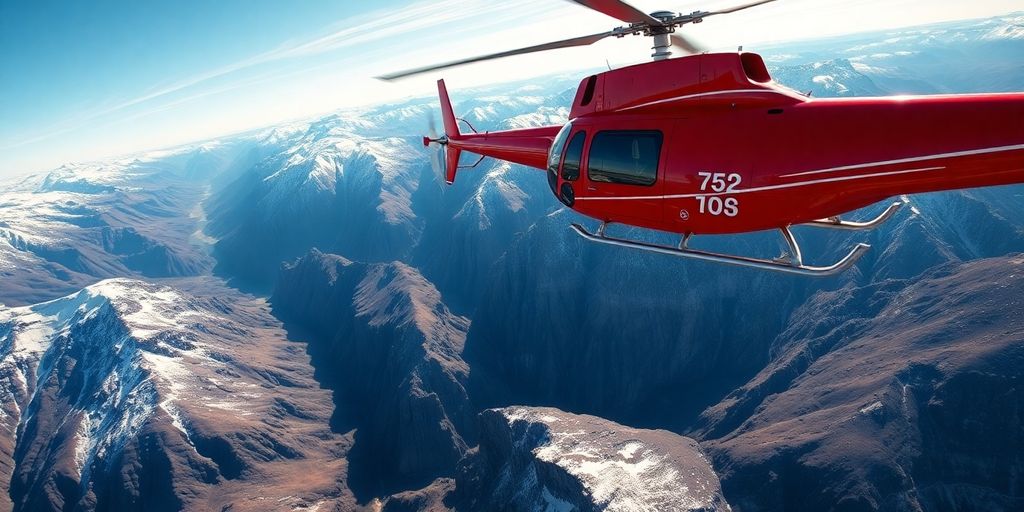 A red helicopter flies over vast, snow-covered Alaskan mountains.