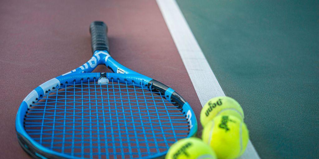 yellow and blue tennis racket