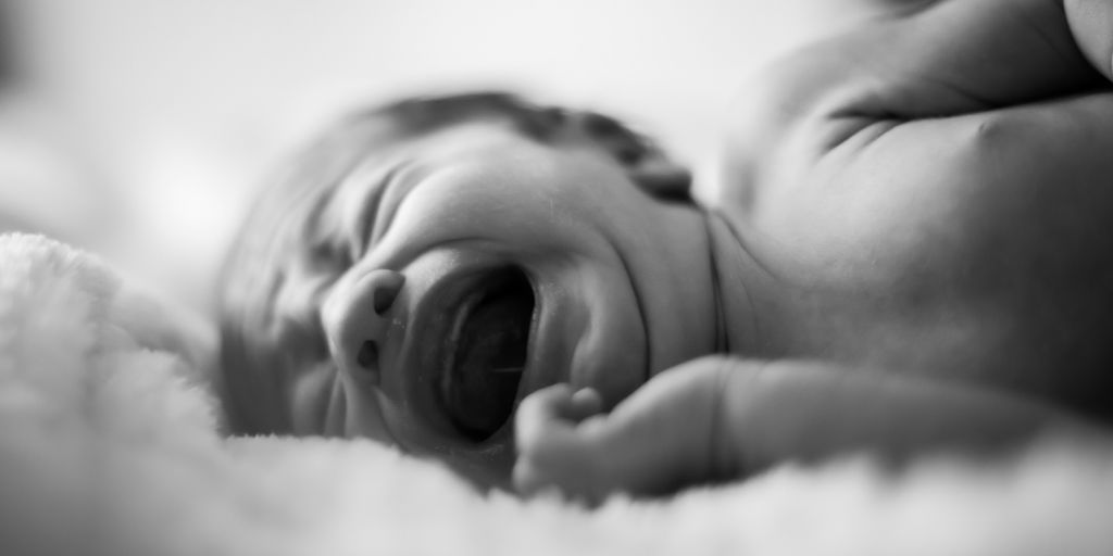 a baby with its mouth open