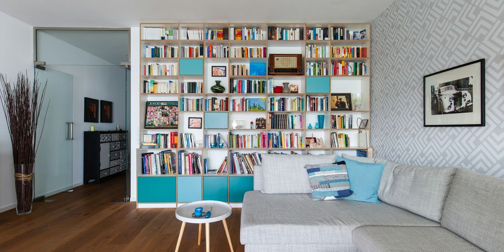 white wooden shelf with books
