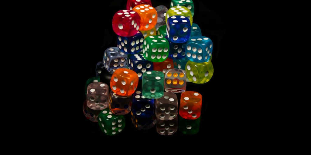 A pile of dice sitting on top of each other