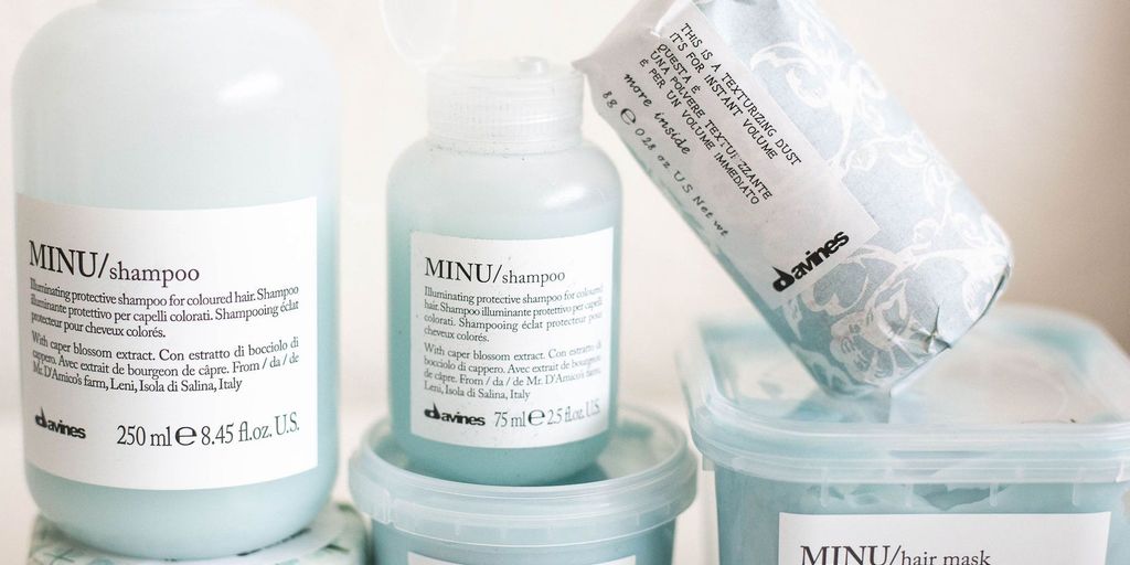 Haircare products, including shampoo and hair mask, arranged neatly.