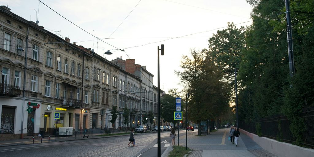 A person riding a skateboard on a city street