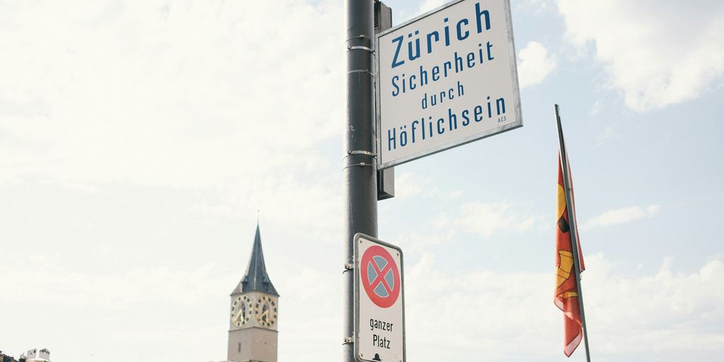 blue and white street sign