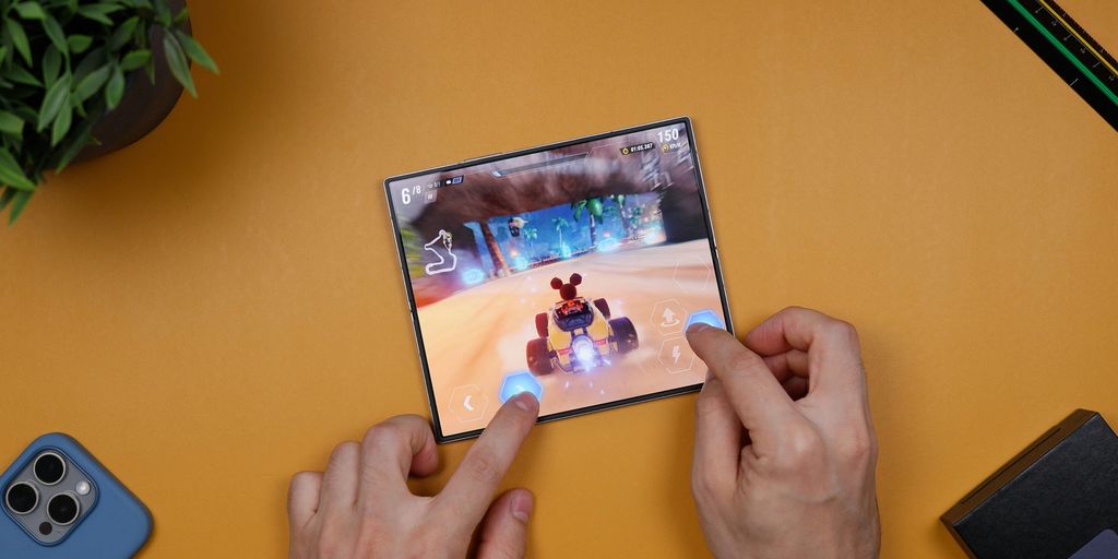 A person playing a video game on a table