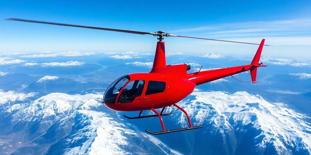 A red helicopter flies over vast, snowy Alaskan mountain peaks.