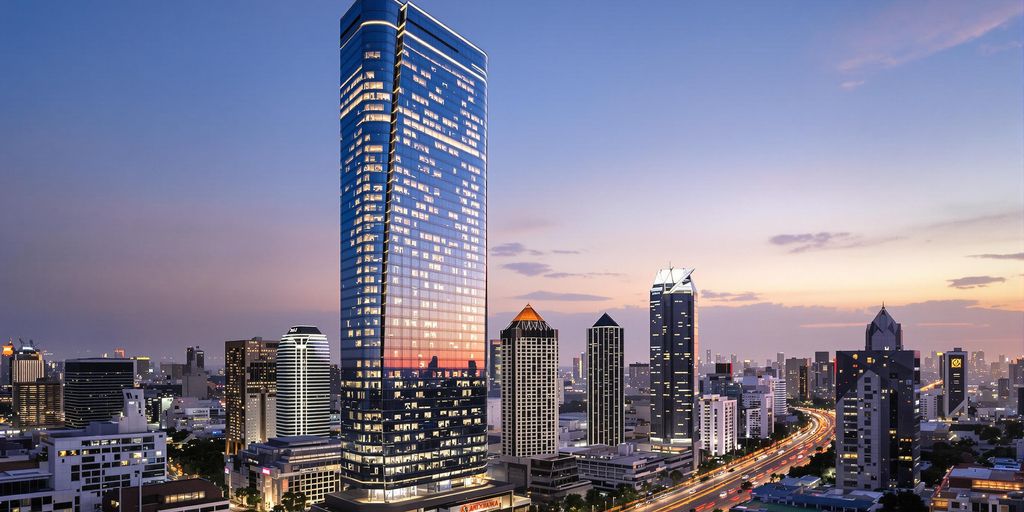 Modern Bangkok skyscraper with warm twilight hues and cityscape detail.
