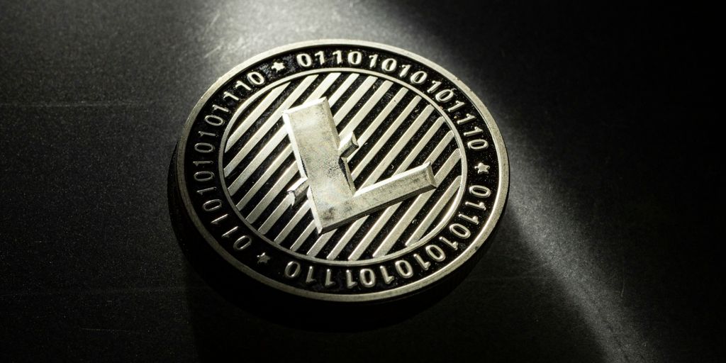 black and silver round logo