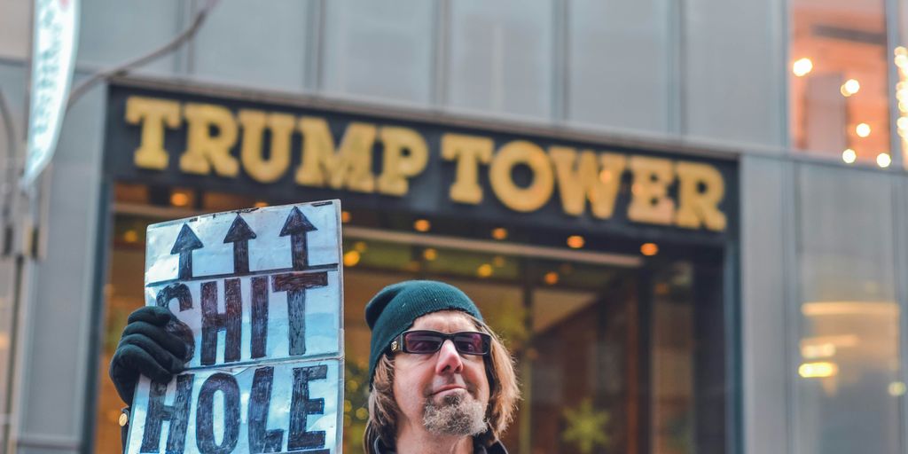 man standing near Trump Tower