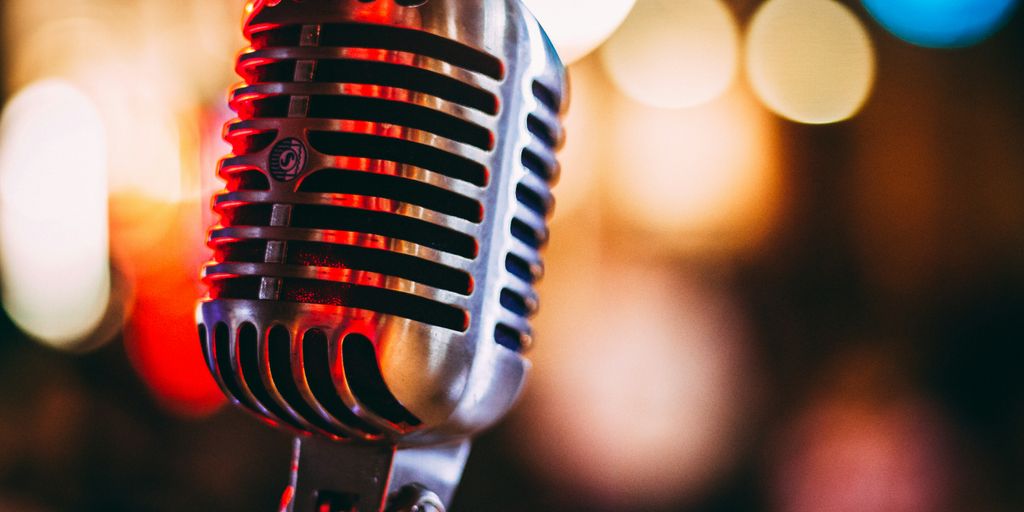 bokeh photography of condenser microphone