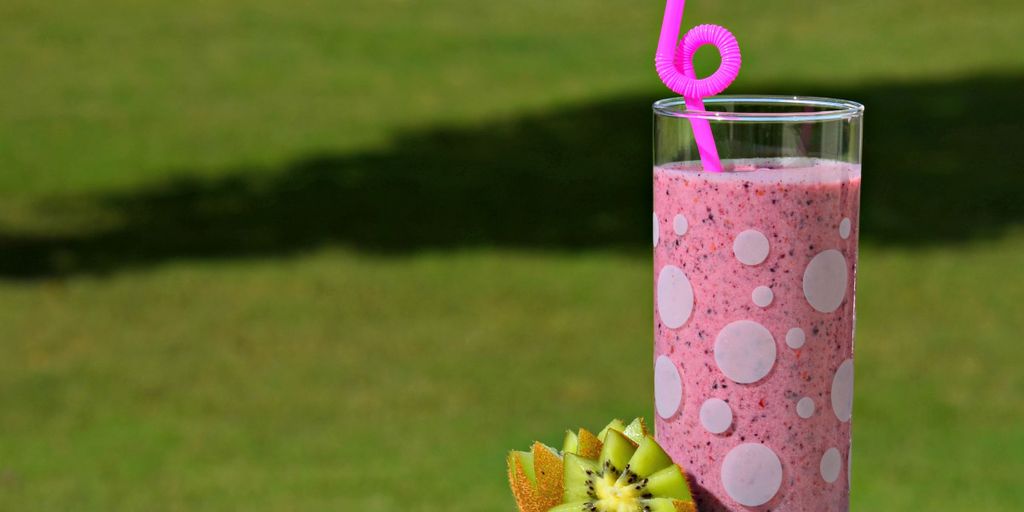 swimmer drinking fruit smoothie