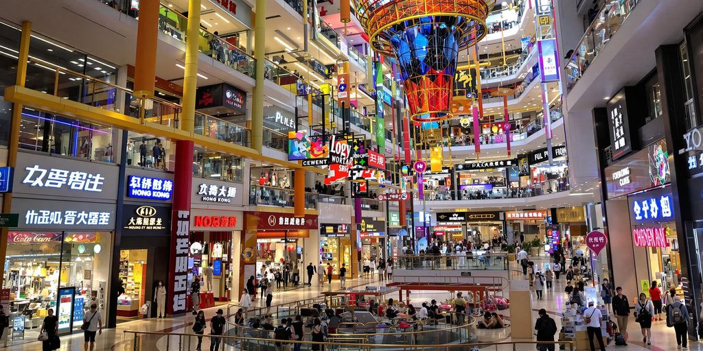 Interior of Hong Kong's largest mall filled with shoppers.