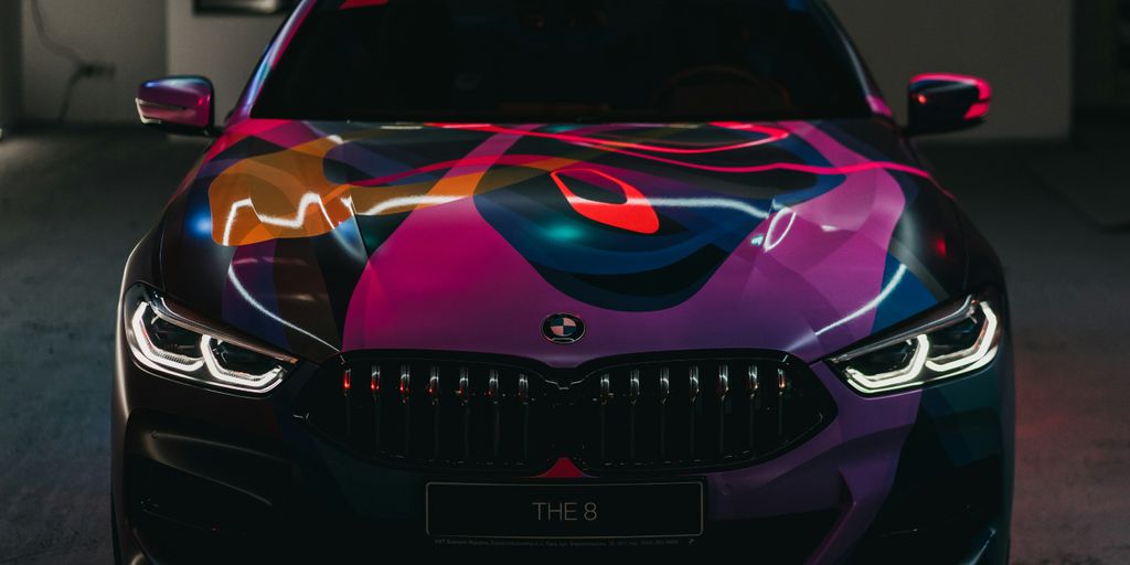 black and purple BMW vehicle