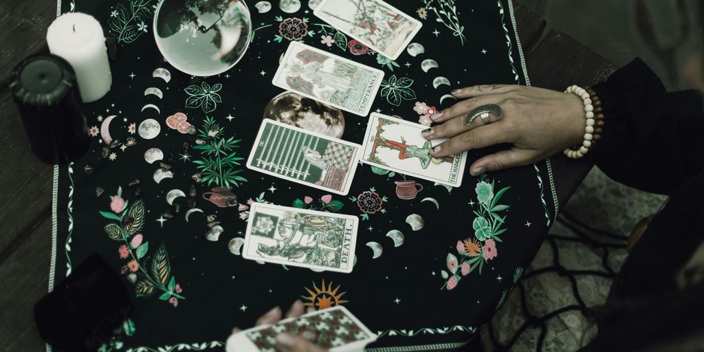 Tarot cards and crystals are used for divination.
