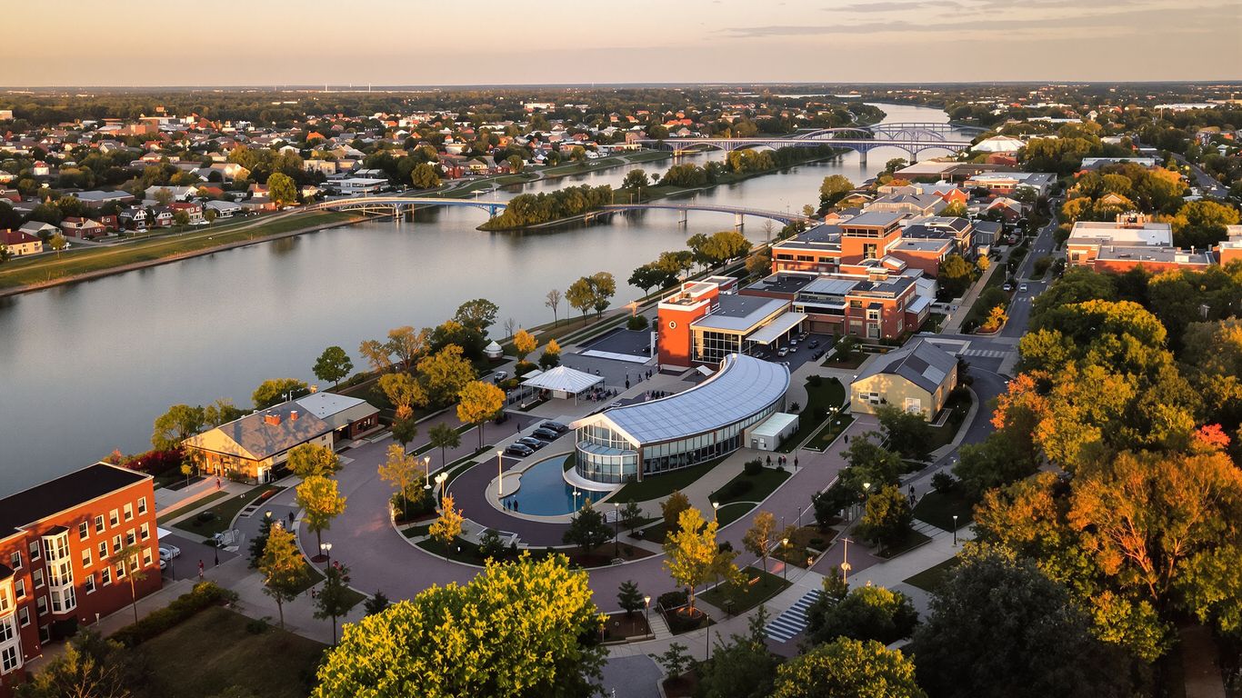 Arkansas River beside Jenks riverwalk, aquarium, and brick downtown streets.