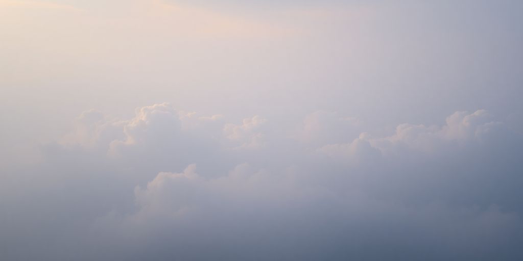 Ethereal landscape with clouds and soft light.