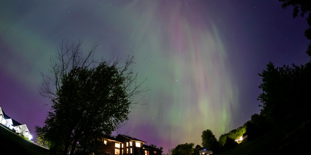 the aurora bore is visible in the night sky