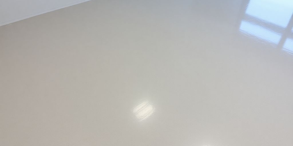 Smooth, glossy epoxy floor coating.