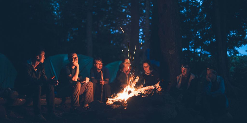 people having a bonfire