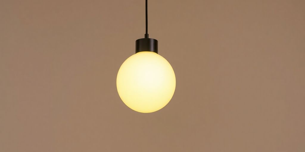 Elegant globe pendant light illuminating a modern room.