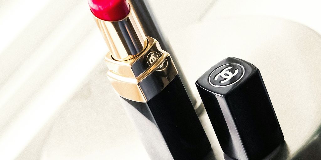 red lipstick on white table