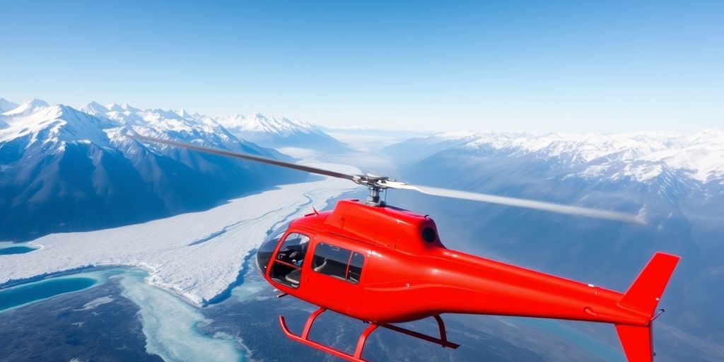 A red helicopter flies over snow-covered Alaskan mountains and glaciers.