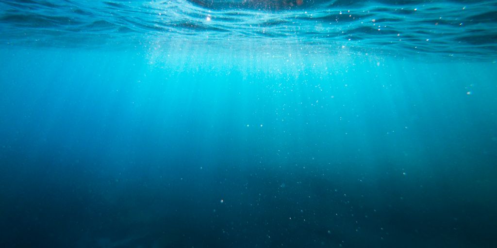 clear blue body of water