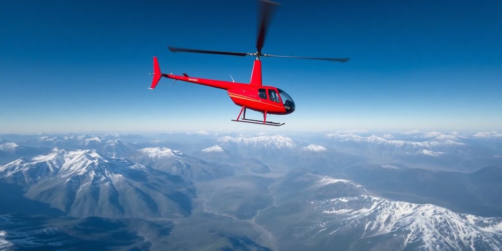 A helicopter flying over a vast, snow-covered mountain range.