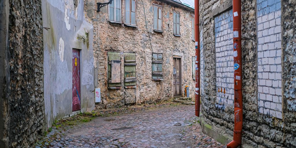 a cobblestone street in an old european village