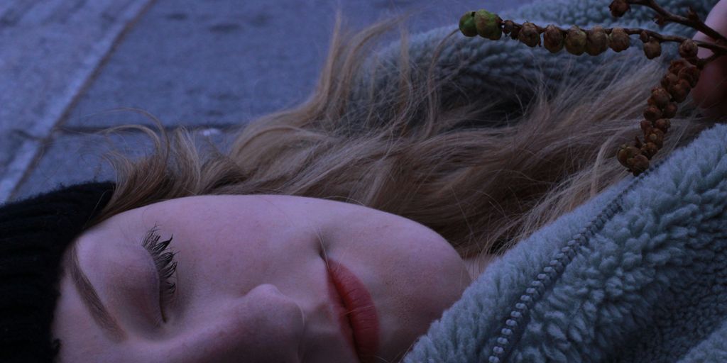 woman lying down in the ground