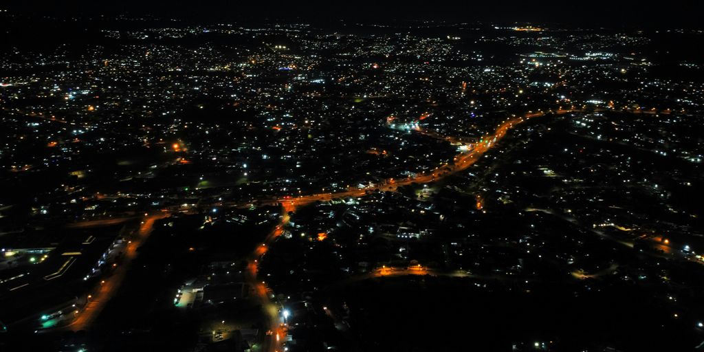 an aerial view of a city at night