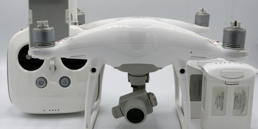 a small white object with a camera attached to it
